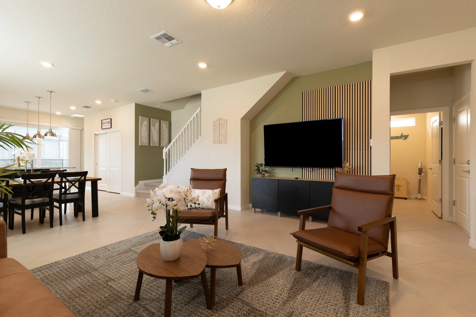 Main living room with staircase at the Clermont, Florida vacation home